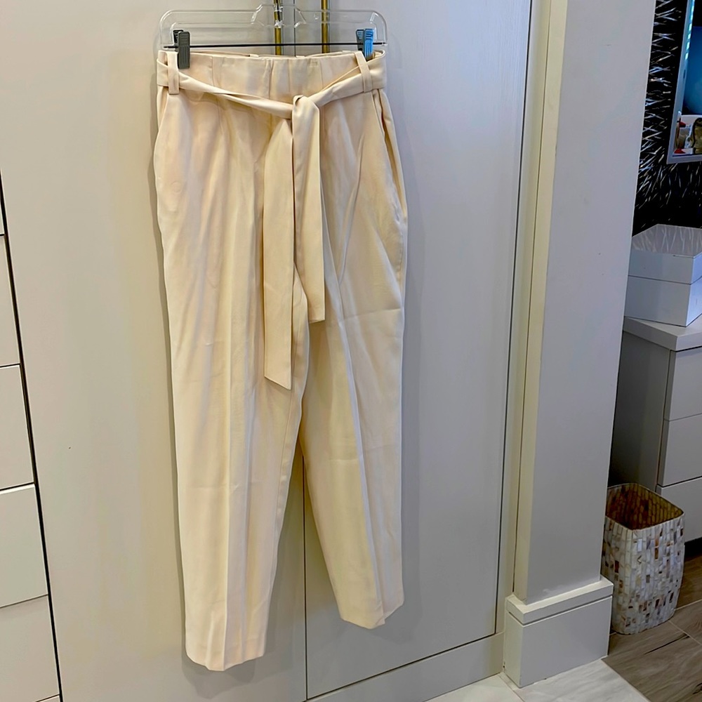 Creamed colored women’s dress pants by State1